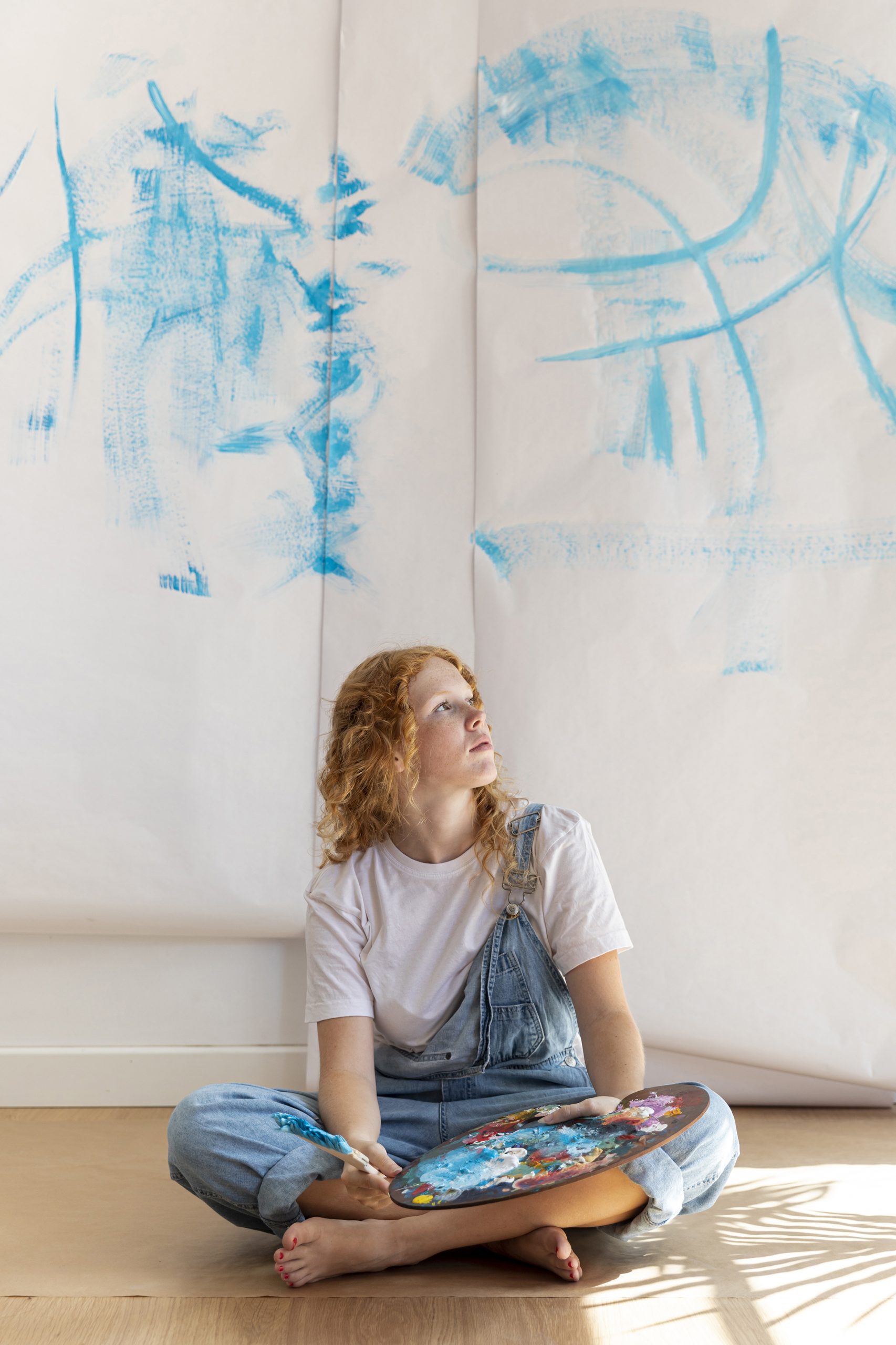 full-shot-sitting-woman-looking-away__